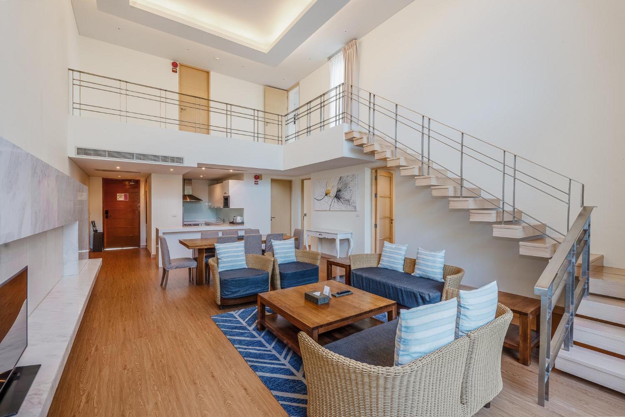Splash Beach Resort, Maikhao Phuket - Sha Extra Plus Mai Khao Exterior foto A living room in a duplex suite at the Park Hyatt Maldives